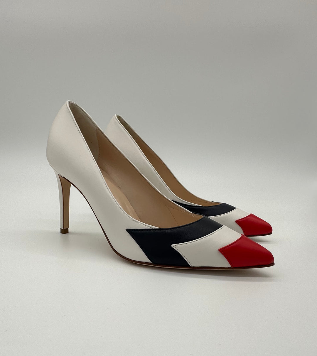 Air Force thunderbird inspired red white and blue pumps.