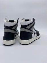 Load image into Gallery viewer, Black and white high top sneakers with Jet embroidered on the side with contrail.
