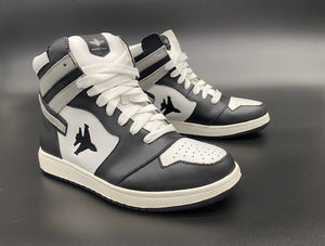 Black and white high top sneakers with Jet embroidered on the side with contrail.
