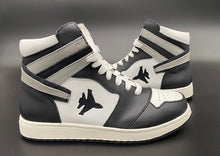 Load image into Gallery viewer, Black and white high top sneakers with Jet embroidered on the side with contrail.

